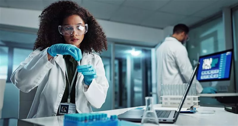 A young woman working in a lab